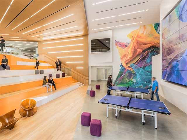 An office multipurpose space with a large video wall