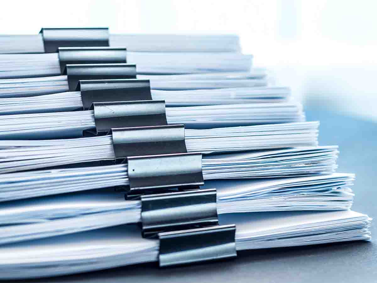 Stack of documentation with clips