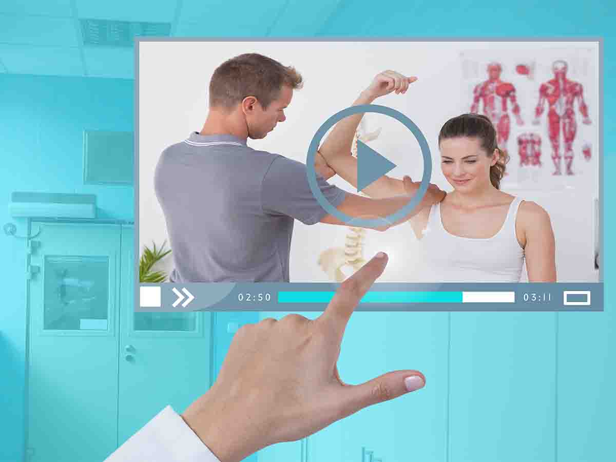 hand touching a screen to play a video