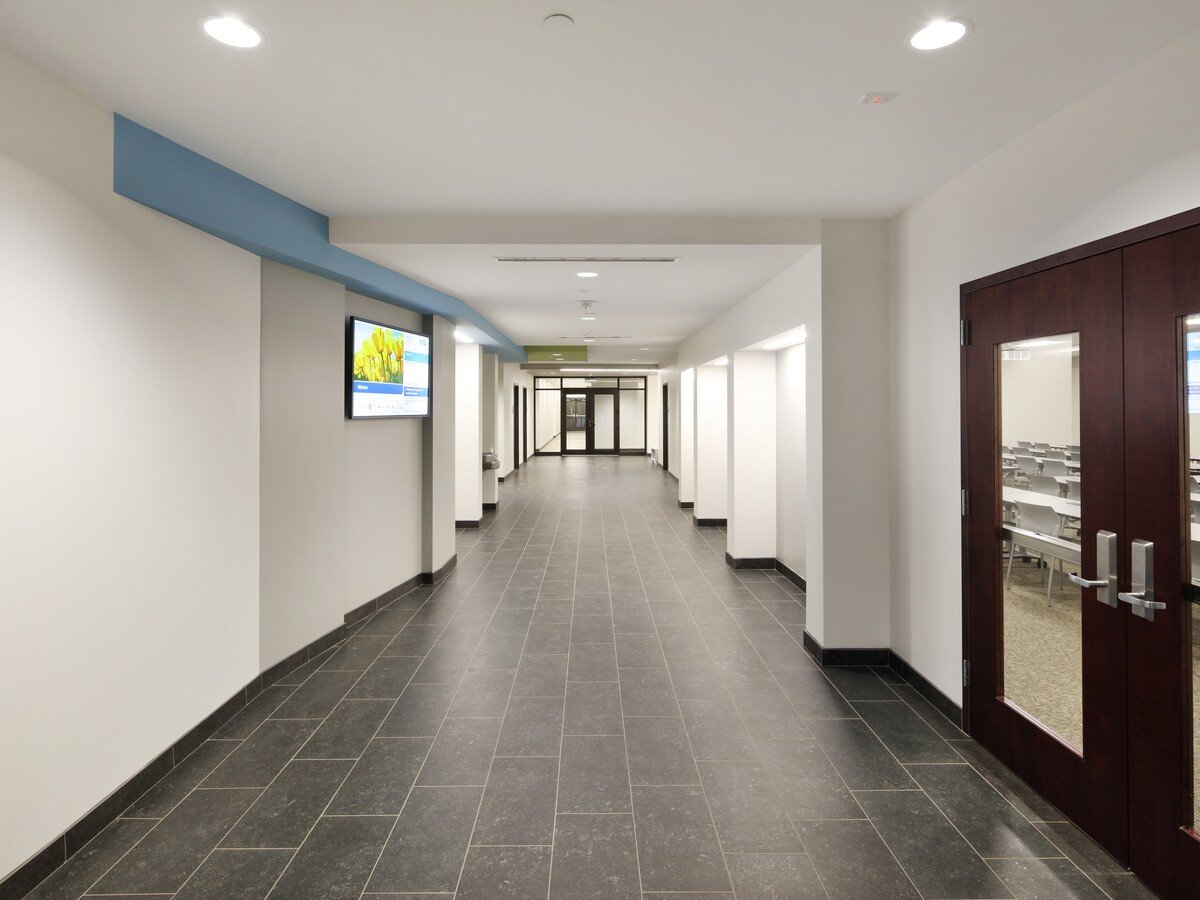 Church hallway with a digital display mounted on the wall