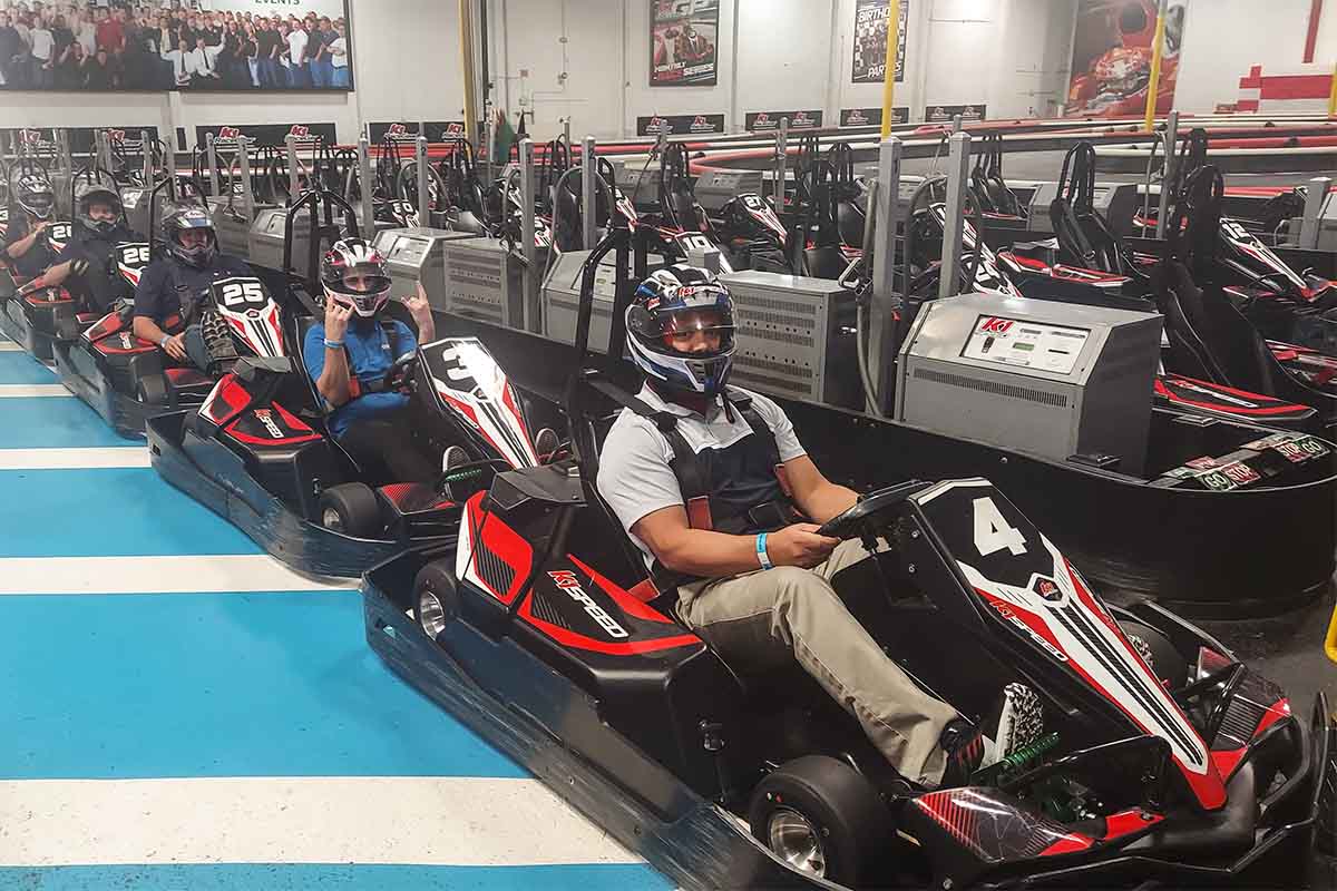 Avidex Sales Team celebrating with a go kart race