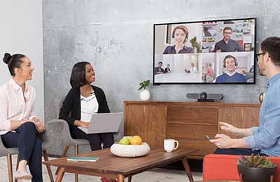 A group having a team video conference meeting