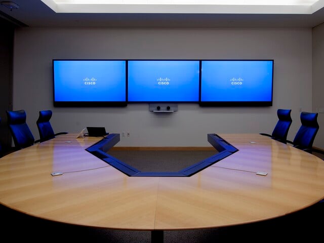 cisco meeting room with three televisions